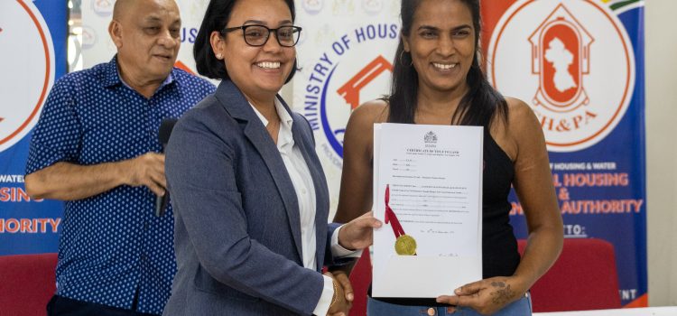 First Sixteen Pigeon Island Squatters Receive Land Titles